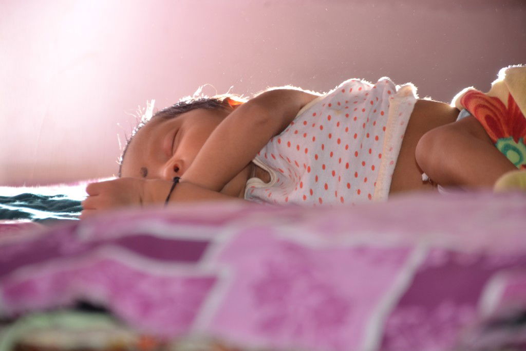 Memphis Moms Blog girl cosleeping on mom's bed