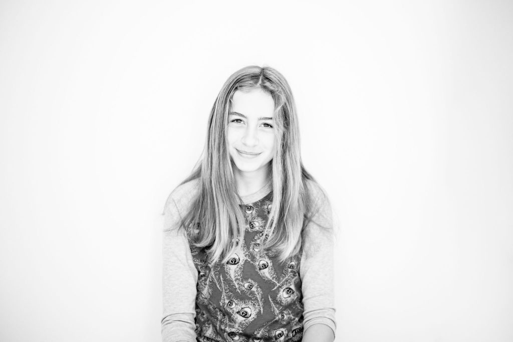 black and white photo of a tween