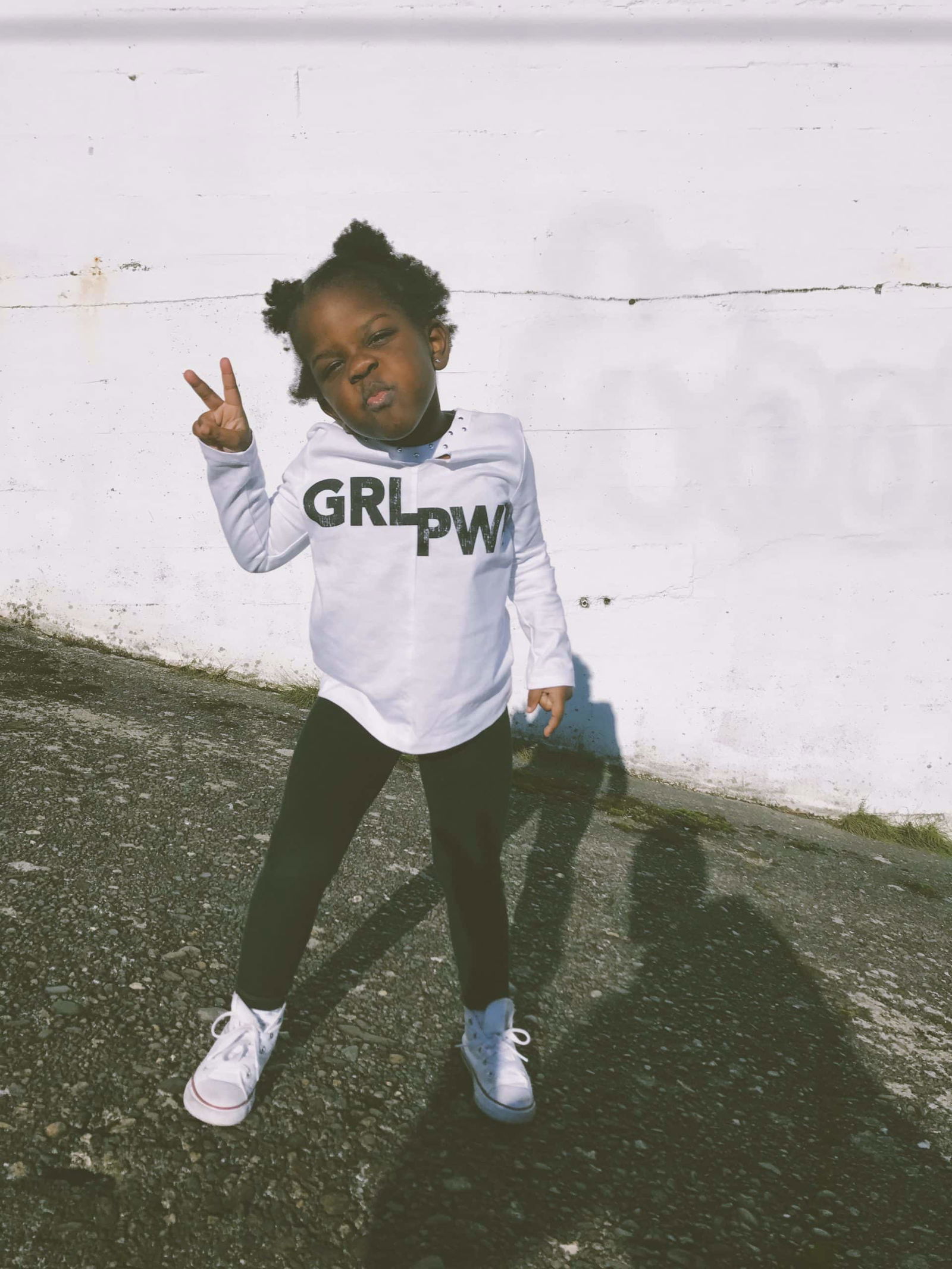 picture of toddler girl wearing girl power shirt