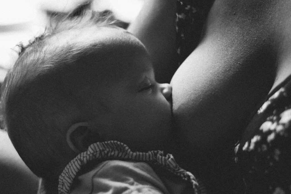 mom breastfeeding her baby