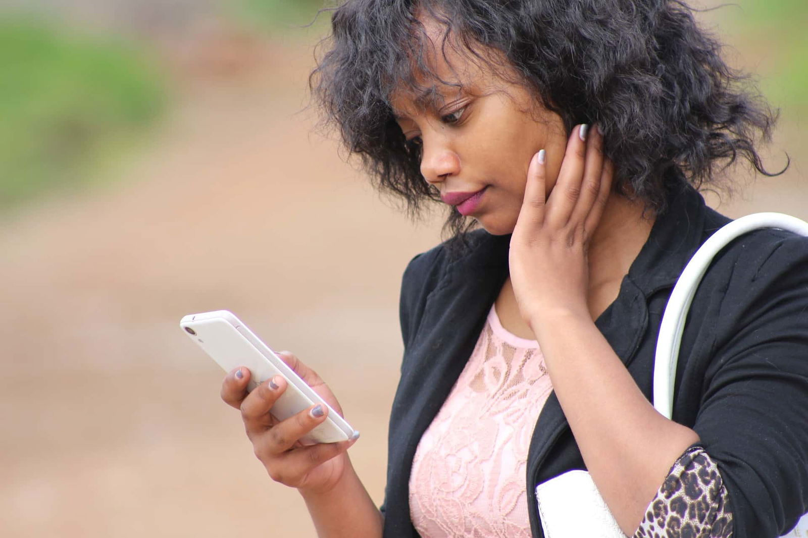 woman looking at phone