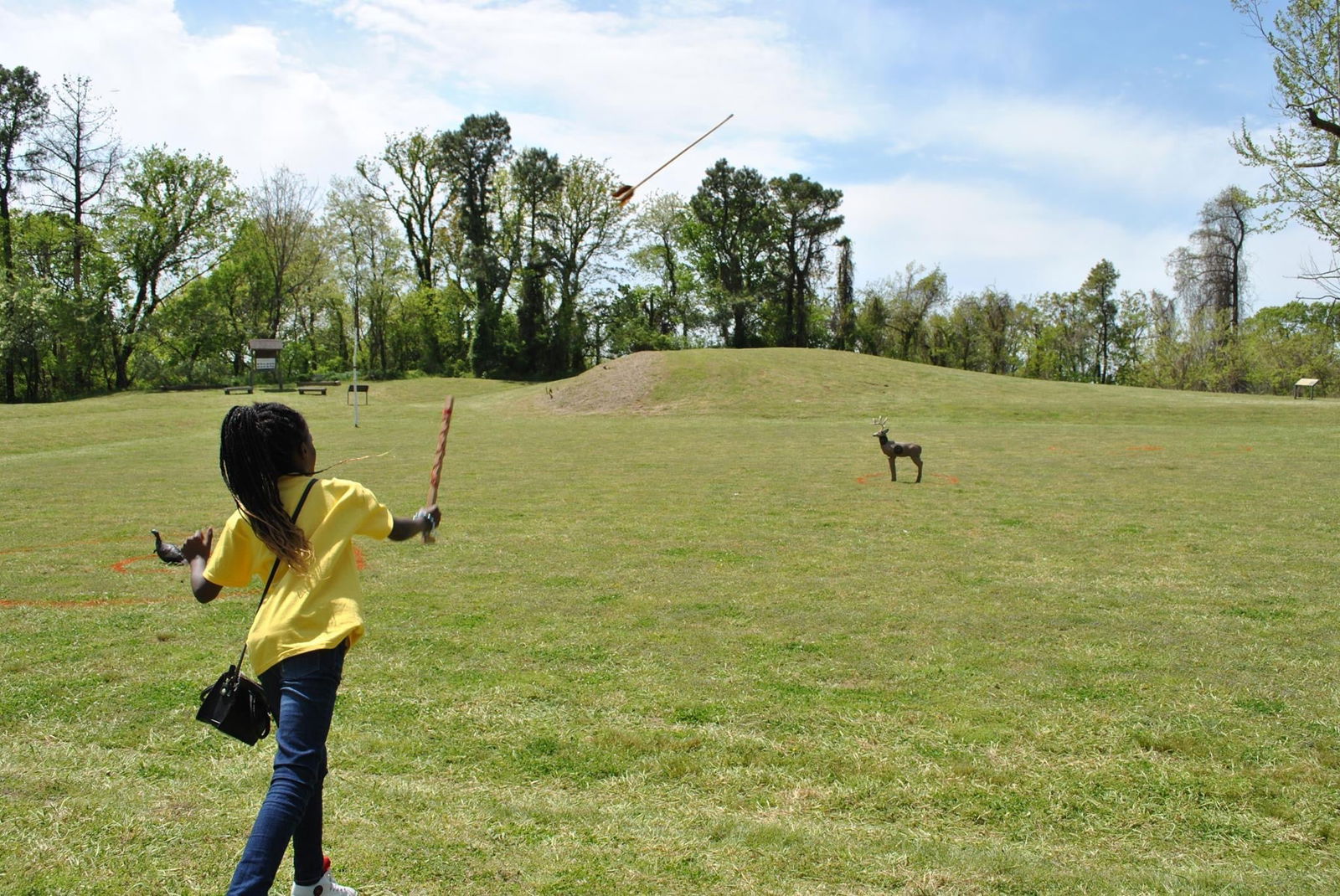 Dart throwing during family day at Chucalissa