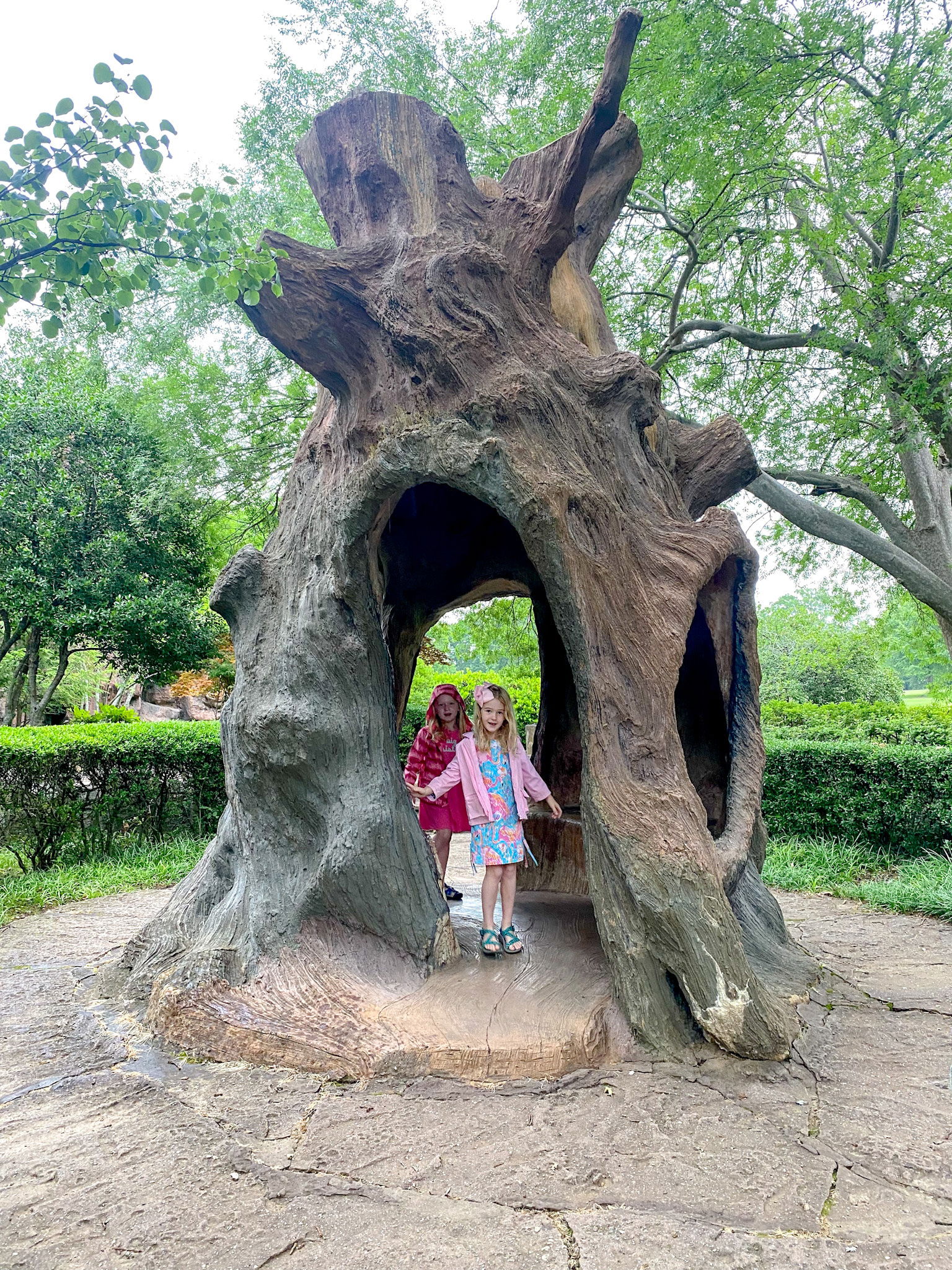 two girls at the tree at the Crytal Shrine Grotto