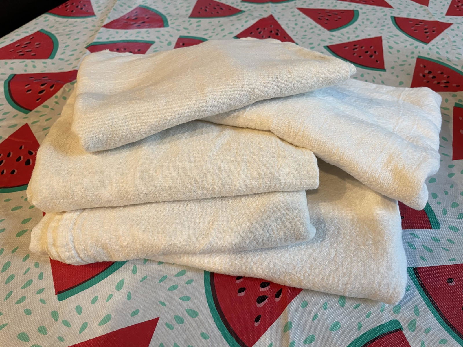 Image of a stack of 5 white towels