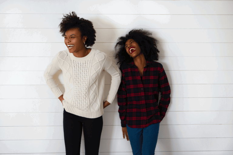 two black women with natural hair