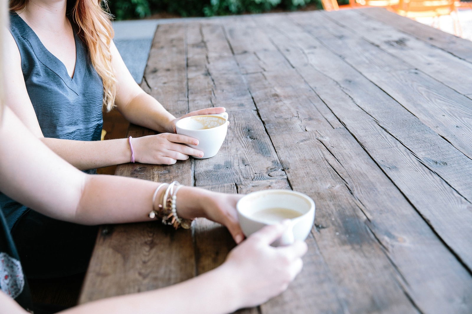 two friends sharing coffee