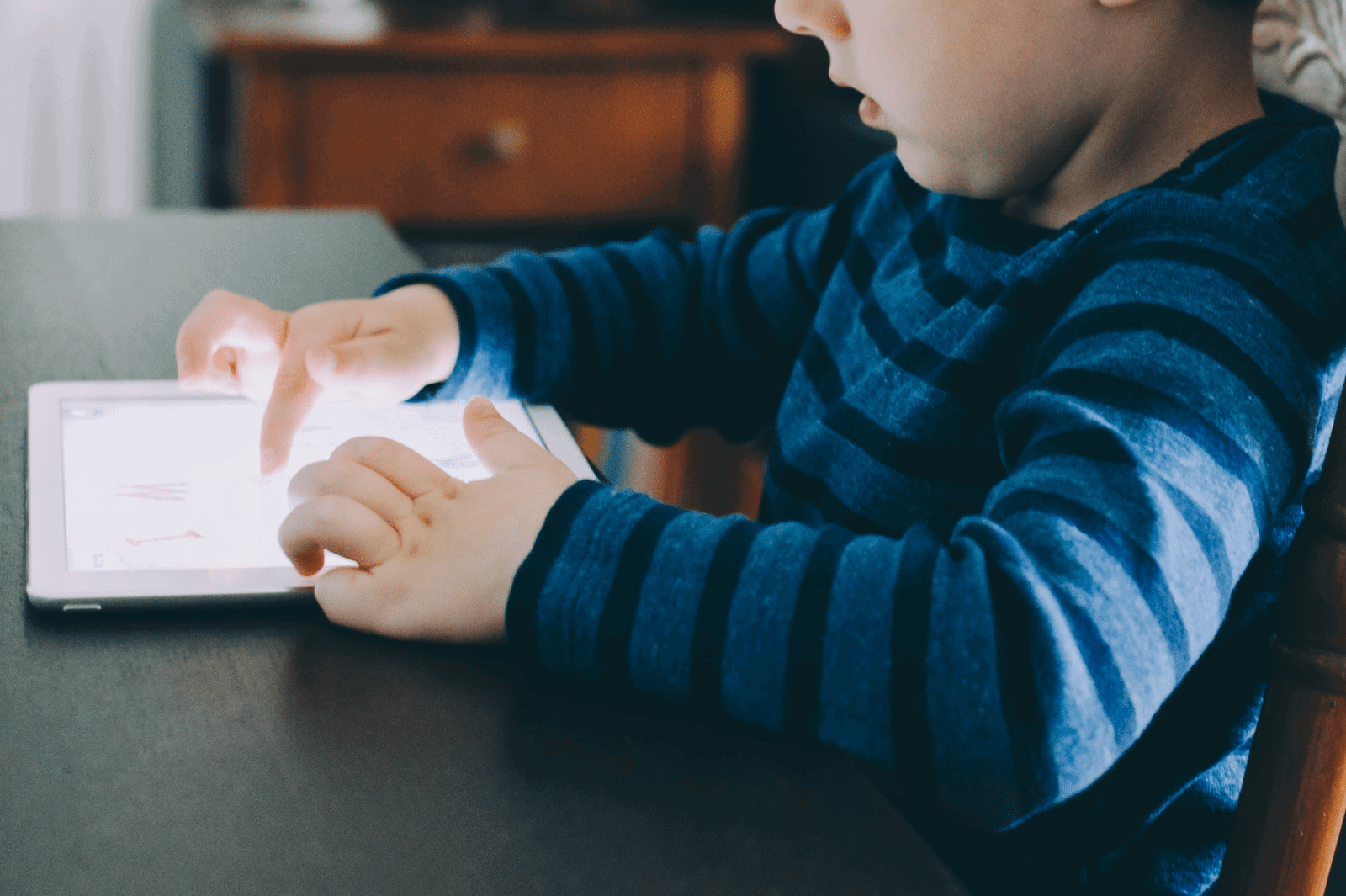 child using an ipad