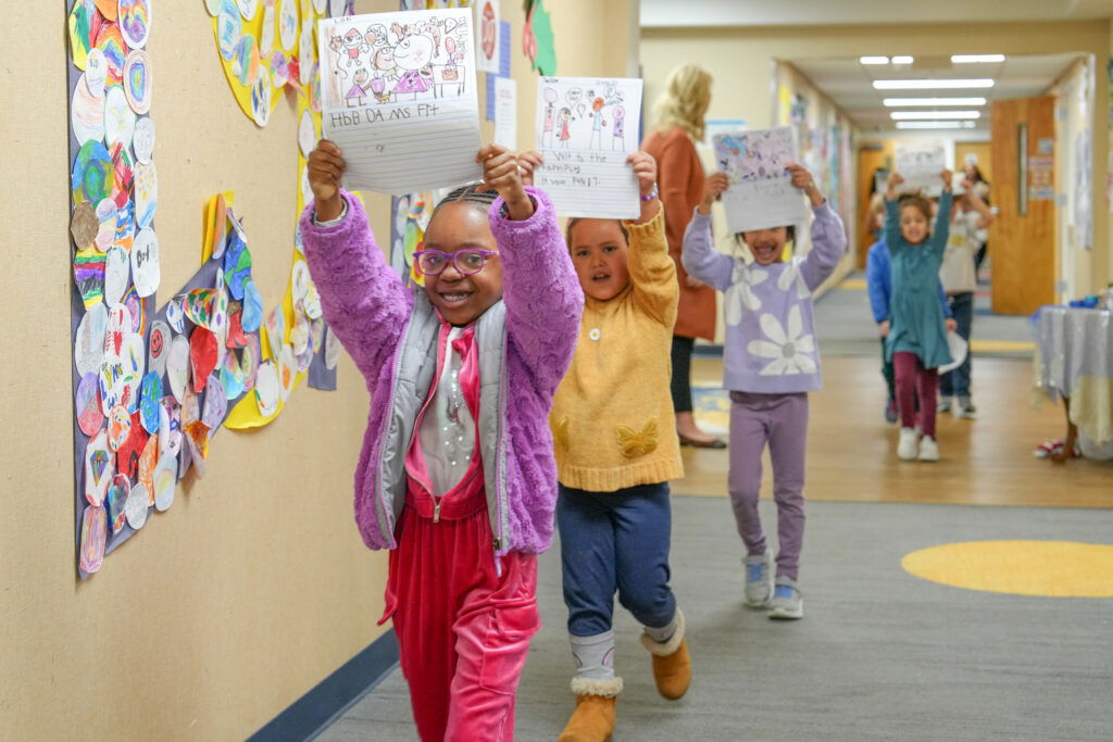 writers parade at a co-ed school