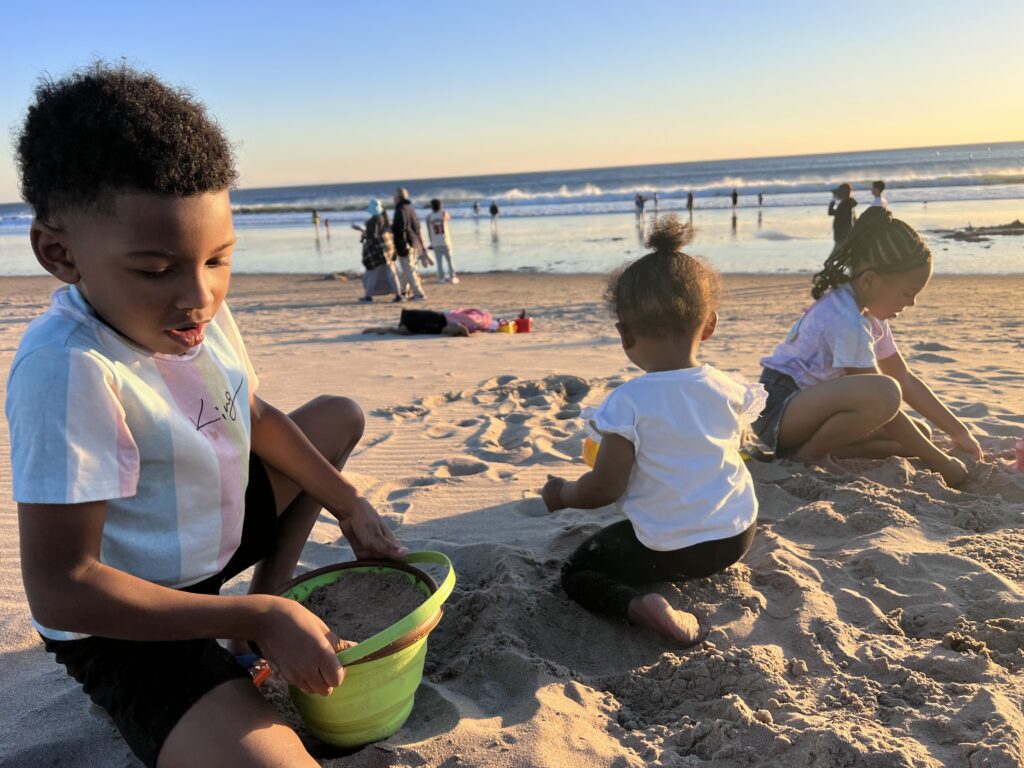 kids playing on the beach